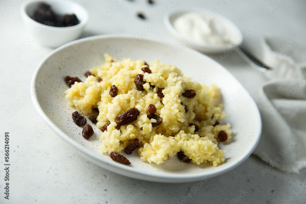 Homemade millet porridge with raisins Homemade millet porridge with raisins