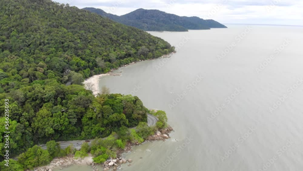 Beautiful aerial view of sea near greenery and tropical mountains Beautiful aerial view of sea near greenery and tropical mountains