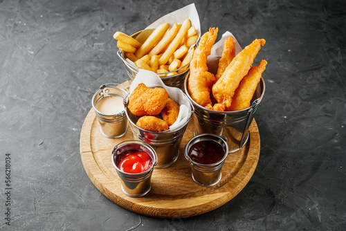 delicious hot snacks of fries shrimp and nuggets