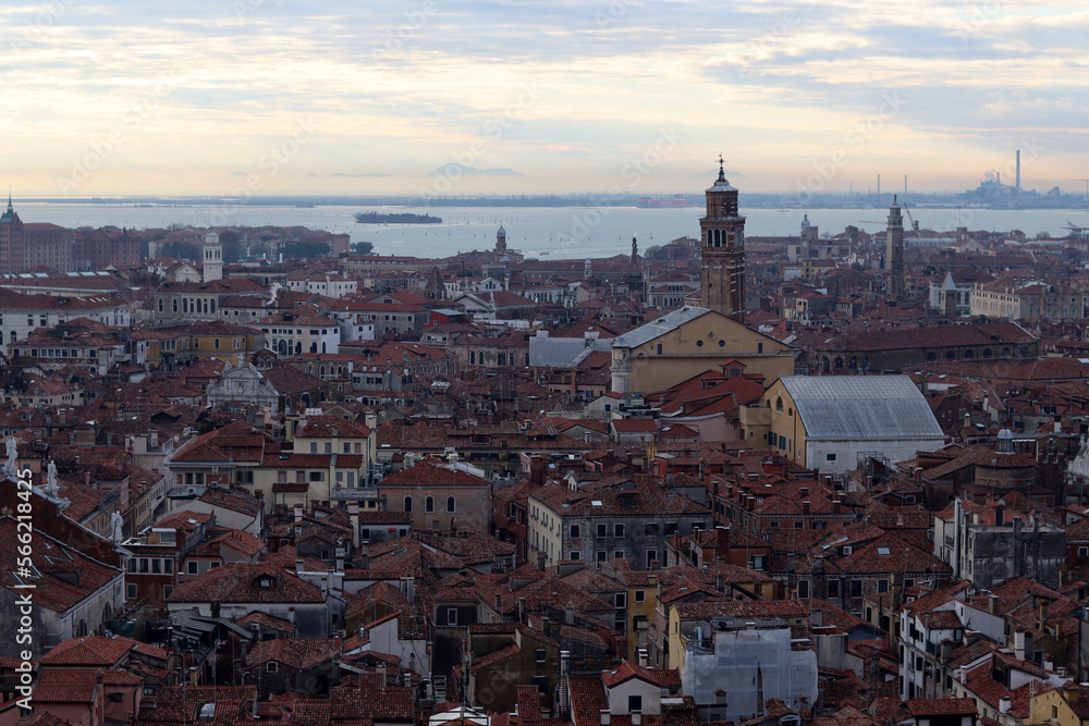 Venice city view from above. Golden hour photo. Beautiful Italian architecture in details. 