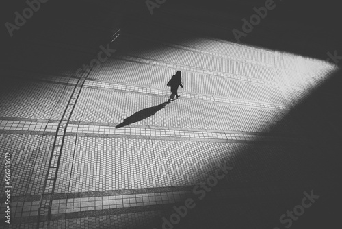 silhouette of a person on the street