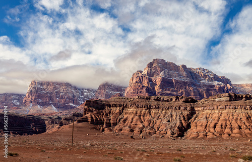 The Snow Dusted Vermilion Cliffs Monument With Low Clouds In Northern Arizona  photo