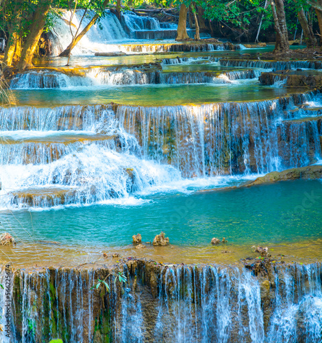 Amazing colorful waterfall in national park forest during spring beautiful deep forest in Thailand technic long exposure  during vacation and relax time.