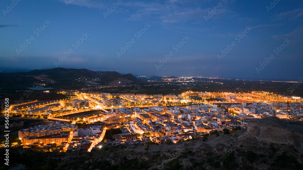 Ciudad de Sagunto en Valencia al anochecer visto desde el Castillo Romano