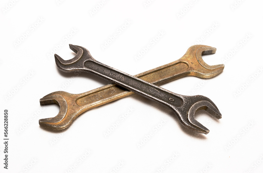 Two old metal wrenches on a white background Two old metal wrenches on a white background