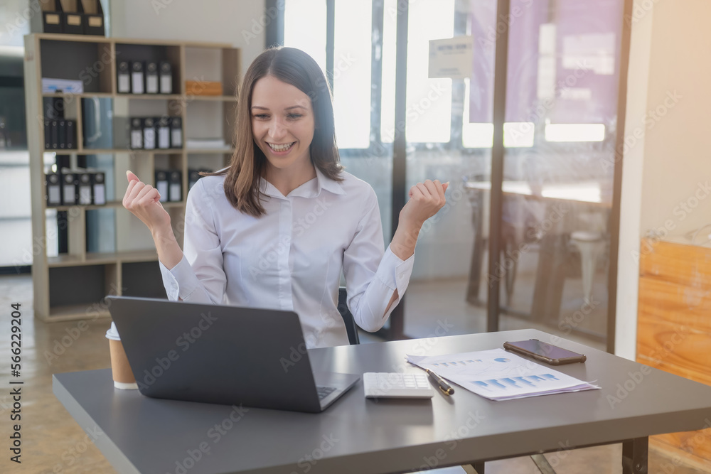 Marketing, Finance, Accounting, Planning. Caucasian businesswoman holding mobile phone and showing goodwill in customer joining business with company to increase profit of laptop office and documents Marketing, Finance, Accounting, Planning. Caucasian businesswoman holding mobile phone and showing goodwill in customer joining business with company to increase profit of laptop office and documents