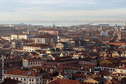 Venice city from above. Beautiful panoramic view of Italian city. Golden hour photo of Italy. Romantic tourist destination concept.  © Maya