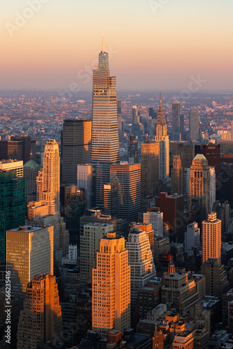 New York City aerial view of midtown Manhattan skyscrapers at sunset. The elevated view includes a new supertall building © Francois Roux