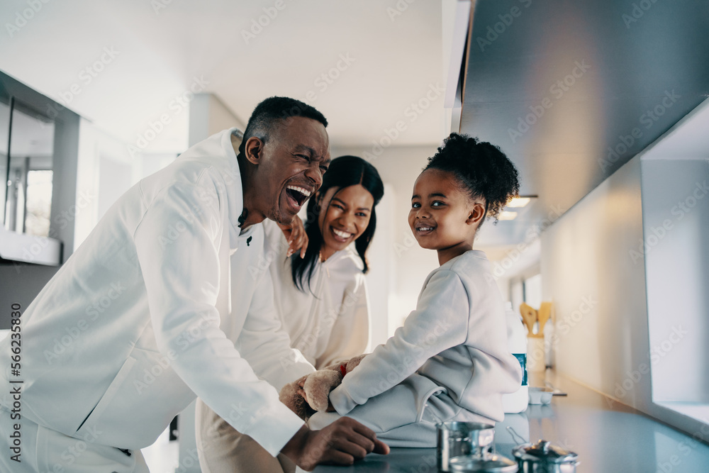 Parents enjoying spending time with their little daughter at home Parents enjoying spending time with their little daughter at home