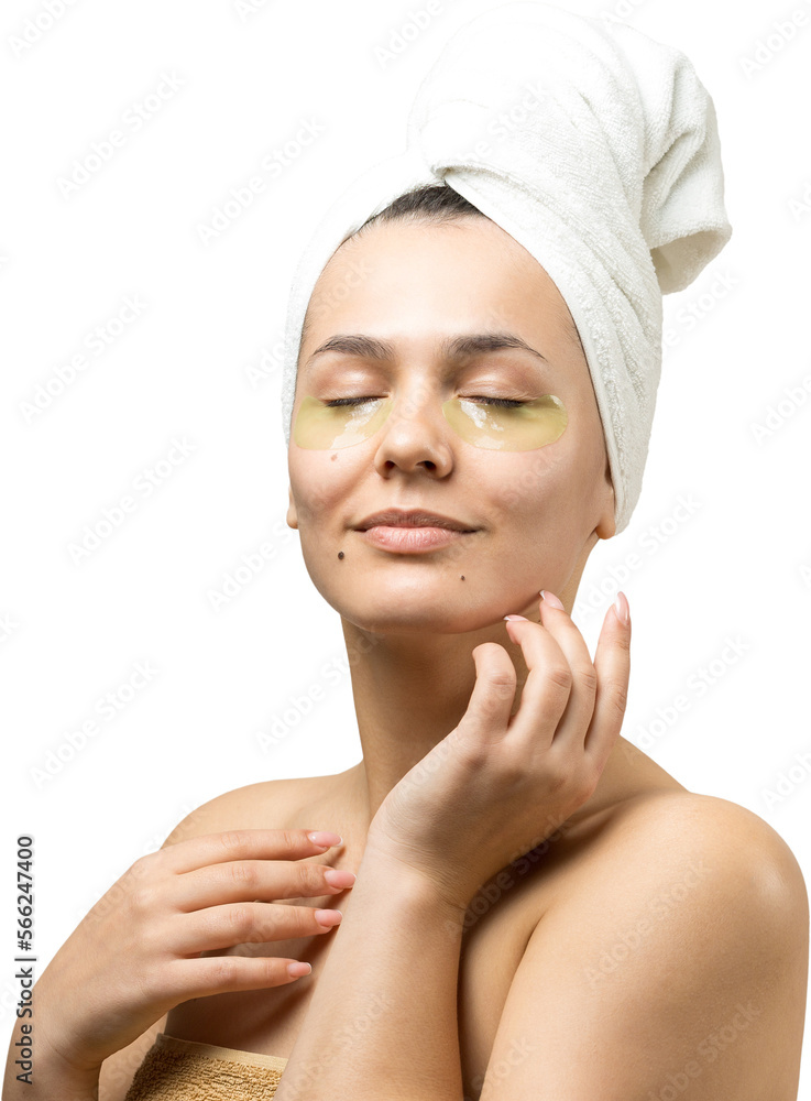 Young beautiful girl in a white towel on his head wears collagen gel patches under her eyes. Mask under eyes treatment face. Young beautiful girl in a white towel on his head wears collagen gel patches under her eyes. Mask under eyes treatment face.