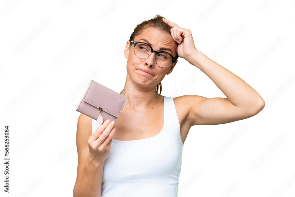 Young caucasian woman holding a wallet over isolated background having doubts and with confuse face expression Young caucasian woman holding a wallet over isolated background having doubts and with confuse face expression