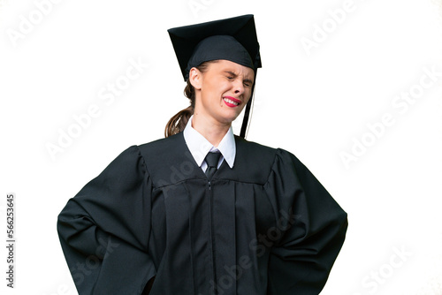 Young university graduate caucasian woman over isolated background suffering from backache for having made an effort