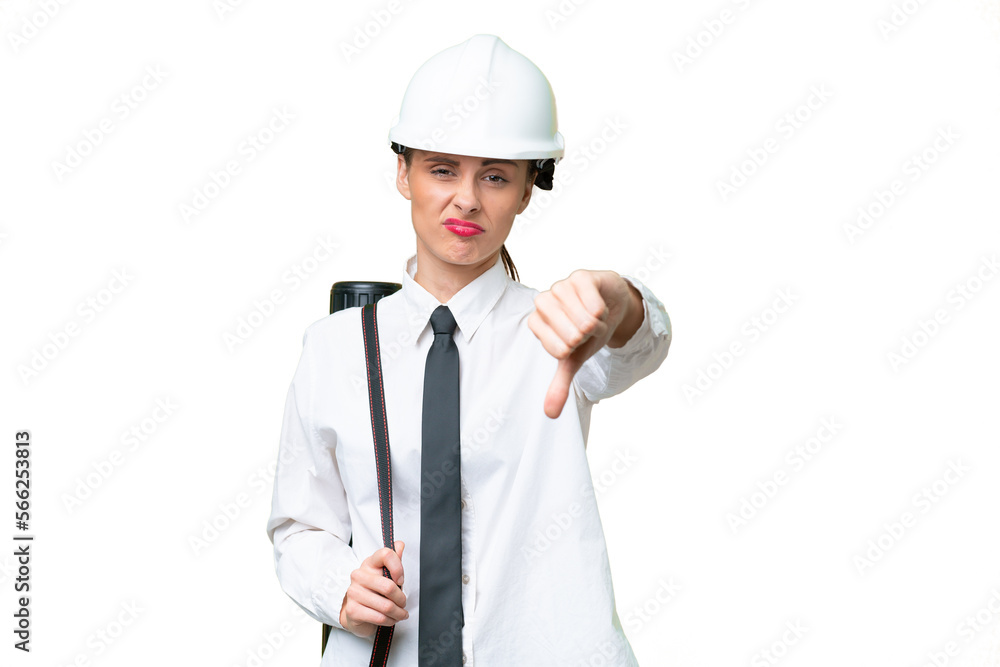 Young architect woman with helmet and holding blueprints over isolated background showing thumb down with negative expression Young architect woman with helmet and holding blueprints over isolated background showing thumb down with negative expression