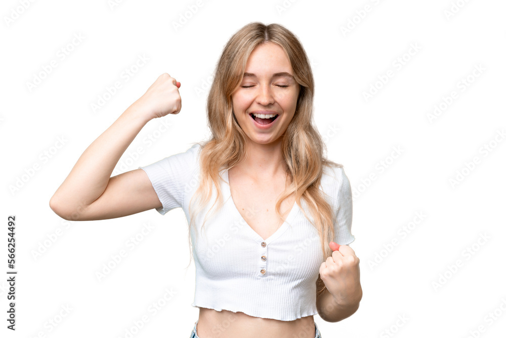 Young English woman over isolated background celebrating a victory Young English woman over isolated background celebrating a victory