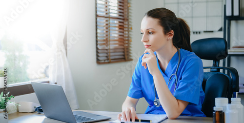 Medical technology concept. Doctor working with mobile phone and stethoscope in modern office photo