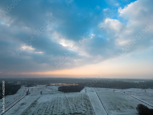 Winter frozen lake in a snowy forest top view. Frosty Christmas weather. High quality photo © Bjorn B