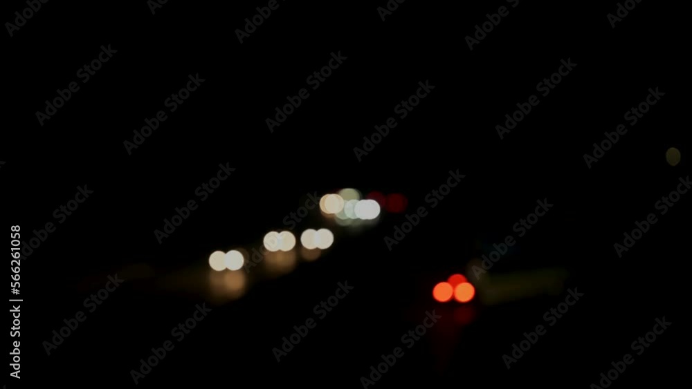 White front and red rear lights as a bokeh effect at night White front and red rear lights as a bokeh effect at night