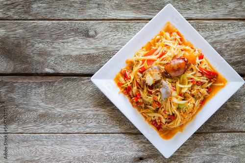 papaya salad, crab, pickled fish.