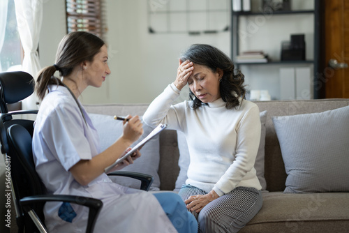 Wallpaper Mural Female doctor explaining diagnosis to her old patient. Torontodigital.ca