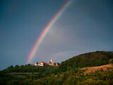 Leuchtenburg castle with a rainbow and a dramatic dark sky, Seitenroda, Germany.