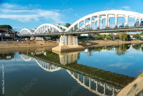 Ratsadaphisek Bridge the bridge over the Wang River in Lampang Province, Thailand photo