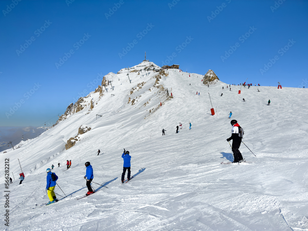 Skiers and snowboarders on the top station of Courchevel and Meribel slopes, France. Skiers and snowboarders on the top station of Courchevel and Meribel slopes, France.