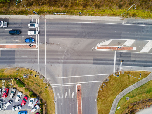 Cars queuing at intersection from overhead photo