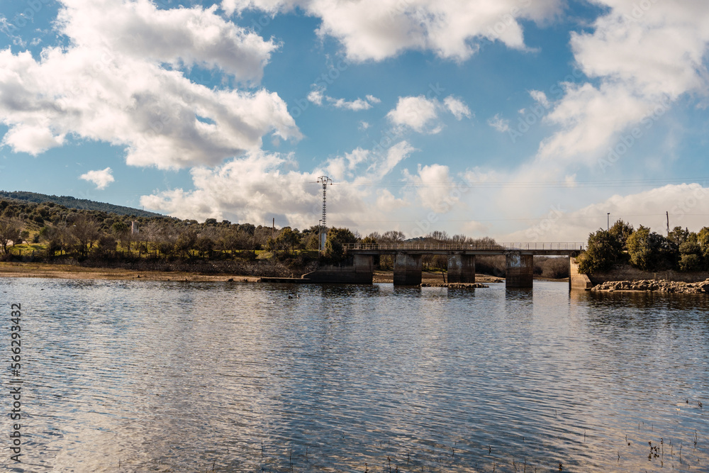 Fototapeta premium Lake with a bridge and mountains