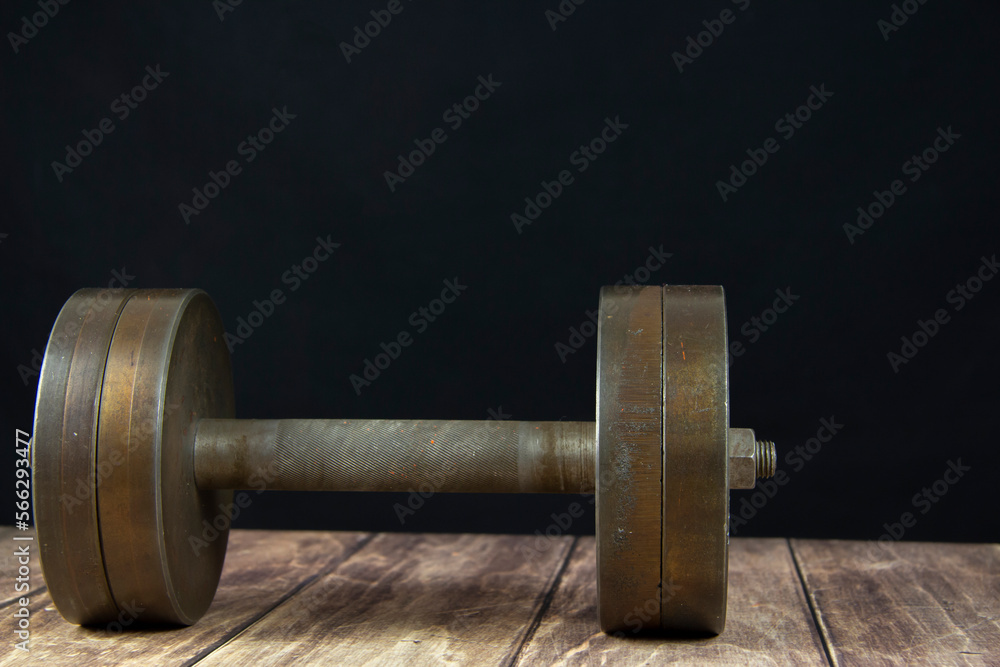 Iron Heavy Dumbbell. Sports equipment. Gray Iron Heavy Dumbbell. Sports equipment. Gray
