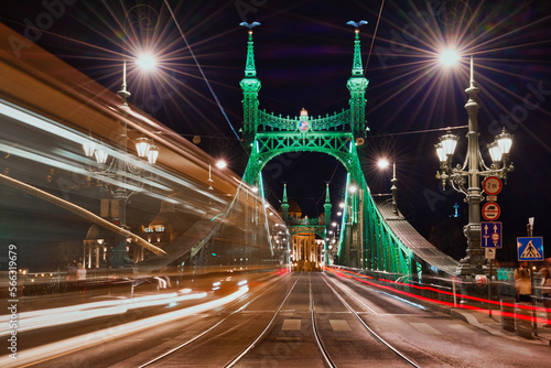 Night view of Liberty Bridge with light trails in Budapest