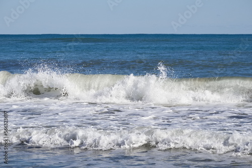 Striking scene of waves breaking on the sand of a Spanish beach   © JuanPablo