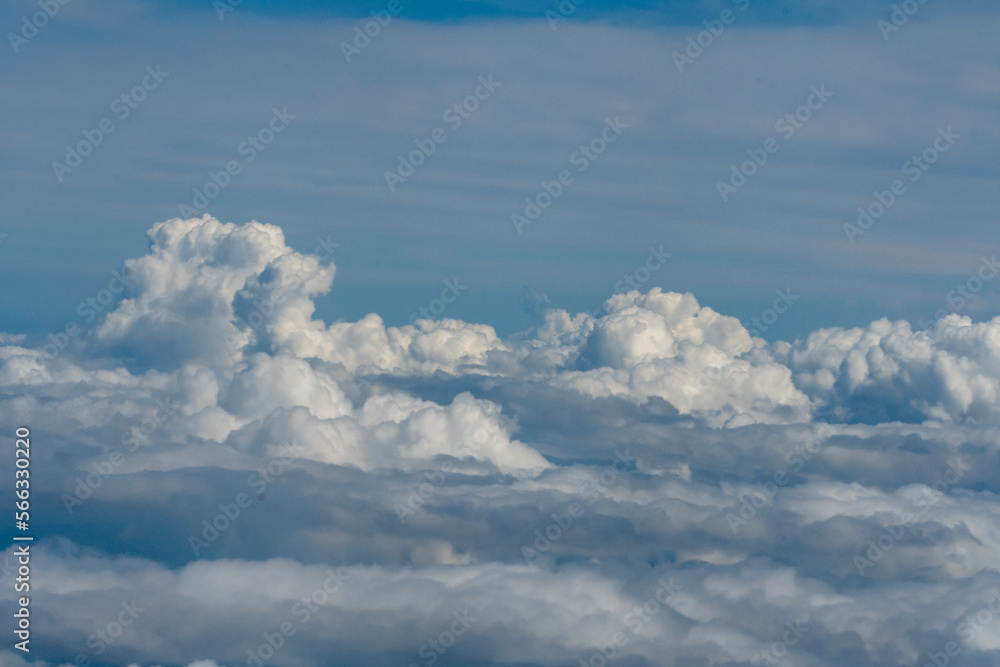 White clouds and blue sky in this aerial photograph of clouds White clouds and blue sky in this aerial photograph of clouds