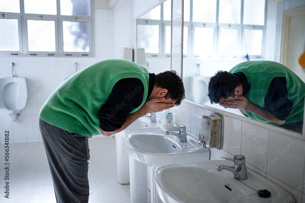 young boy exploring different emotions in front of the mirror young boy exploring different emotions in front of the mirror
