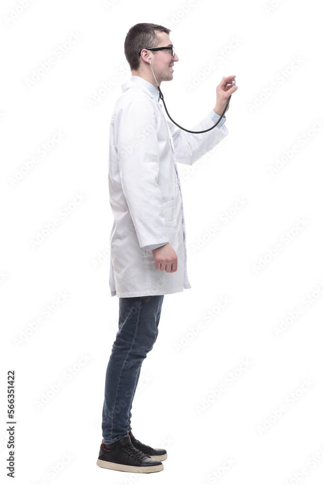 in full growth. a successful male doctor with a stethoscope . in full growth. a successful male doctor with a stethoscope .