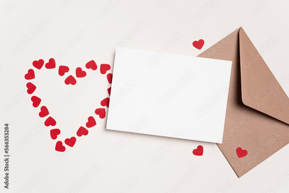 Blank Valentines Day greeting card mockup with red hearts and envelope