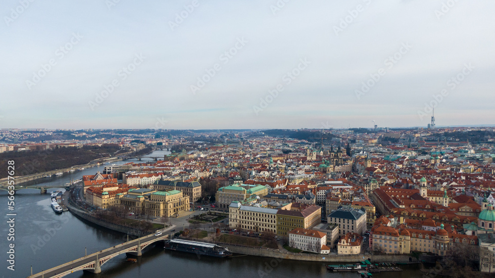 Fototapeta premium Aerial view of River and buildings in Old Town of Prague, Czech Republic. Drone photo high angle view of City