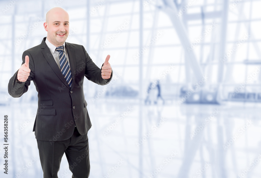 businessman thumb up at the office businessman thumb up at the office