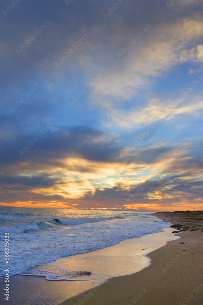 Sunset sky clouds over the sea in Apulia, Italy. Beautiful sunlight in the sea. Amazing nature landscape seascape Colorful sky clouds background.	