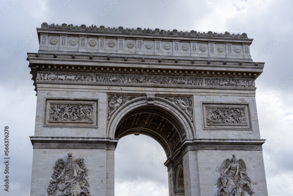 A close up look at the top of the famous landmark, the Arc de Triomphe, is a major attraction in Paris, France. 