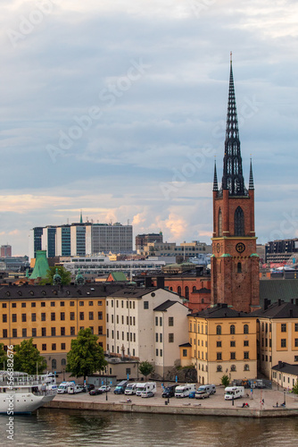 Stockholm, Sweden - July 18th 2022: A view of the Riddarholmen Church of Stockholm's old town from above.