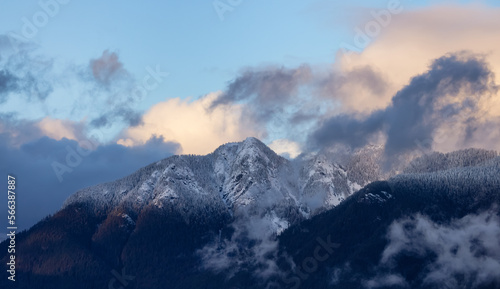 North Shore Mountains Covered in Snow and Clouds. North Vancouver, British Columbia, Canada. Nature Background. Sunset © edb3_16