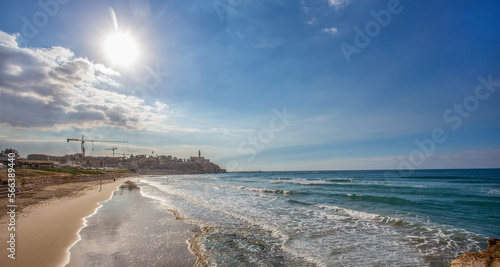 Sand beach in Tel Aviv - view on Old Jaffa and Mediterranean Sea