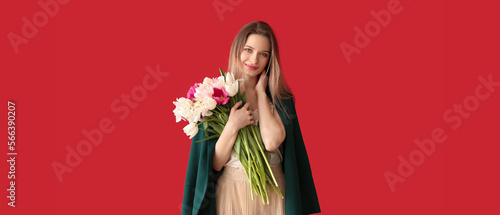 Pretty young woman with bou...
