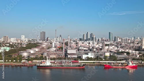 Petrochemical industrial plant at the Chaophaya river in Bangkok Thailand photo