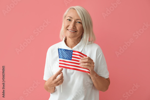 Mature woman with USA flag ...