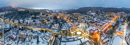 Aerial view of Krynica Zdroj City and Beskid Sadecki Mountains from a drone