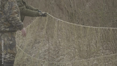 Hunters install cannon net for catching wild animals. photo