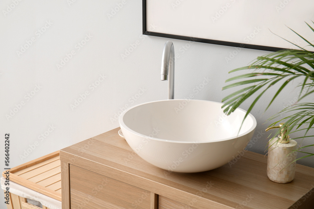 Fototapeta premium Modern sink in interior of stylish bathroom, closeup