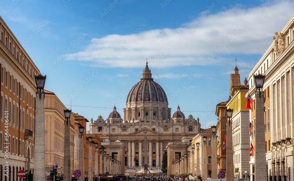St. Peter's Basilica in urban streets of Downtown Rome, Italy. Cloudy Sky.