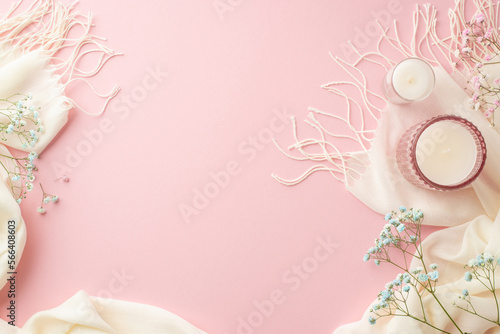 Hello spring concept. Top view photo of candles in glass holders pink and blue gypsophila flowers and white soft scarf on isolated pastel pink background with copyspace